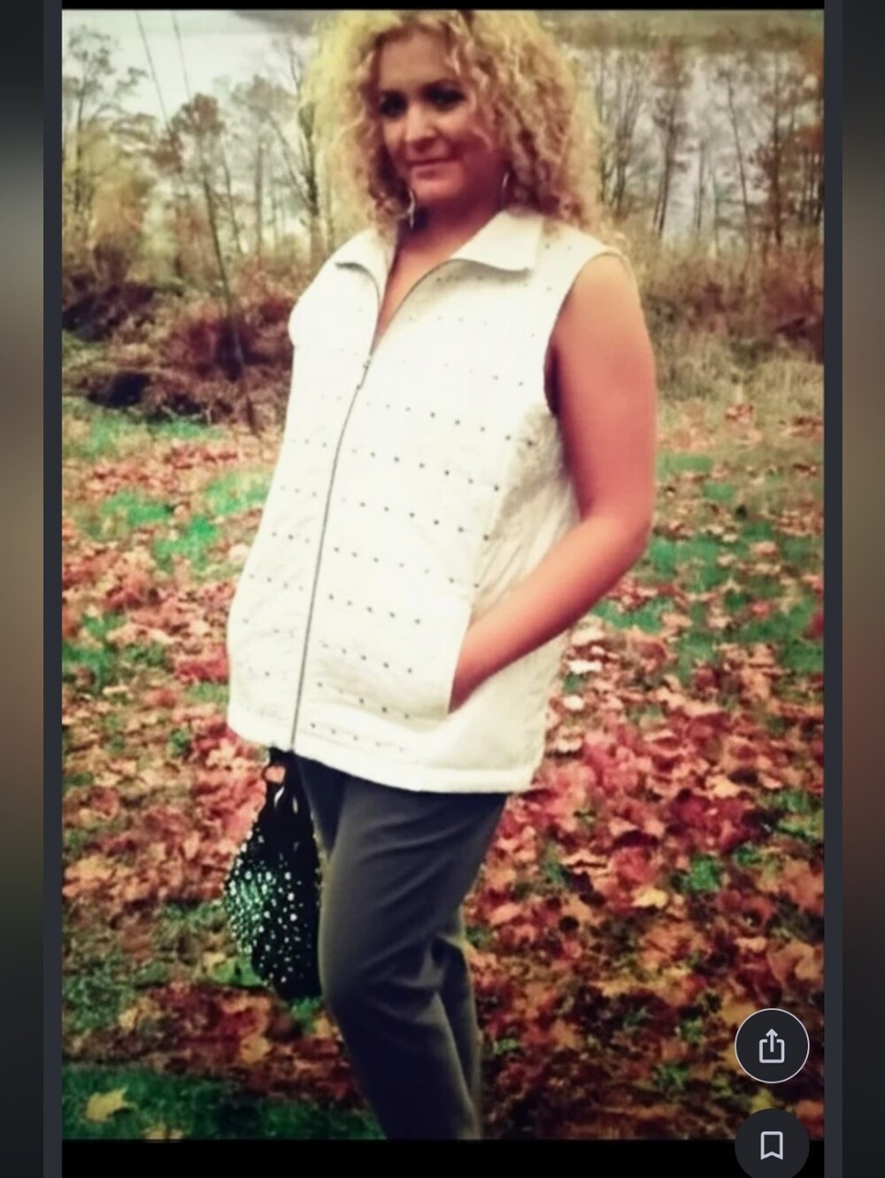Vest by Chicos weekends size (3) silver sparkles over white zipper vest .